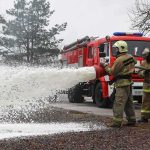 Fuel Tanker ERUPTS — Chaos On 99 Firefighters spraying foam from a hose near a fire engine