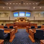 Revolt Inside GOP: DOJ Line Drawn Courtroom interior with wooden benches and judge's bench