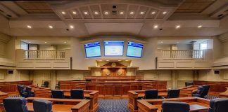 Courtroom interior with wooden benches and judge's bench