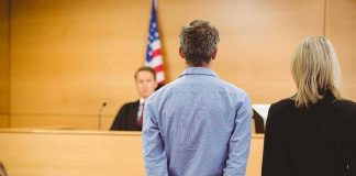 Officer Caught Lying—Verdict Vanishes Defendant in handcuffs stands before a judge in a courtroom