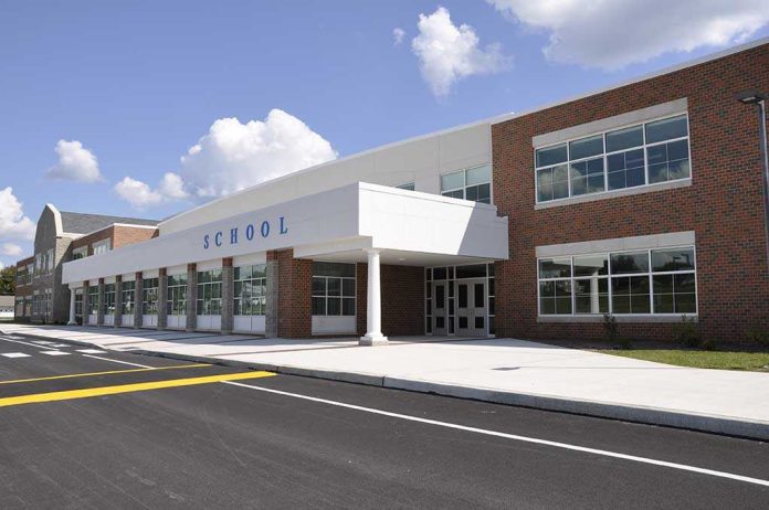 shutterstock_37352986 Modern school building with large windows and a clear sky