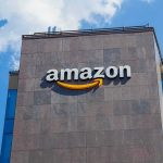 1.2 Million Advertisers—$20B Question Amazon logo on modern office building facade