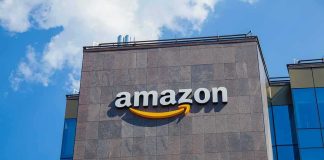 1.2 Million Advertisers—$20B Question Amazon logo on modern office building facade