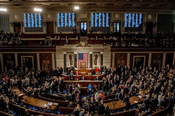 shutterstock_1186368277-4 U.S. House chamber with lawmakers gathered before a session