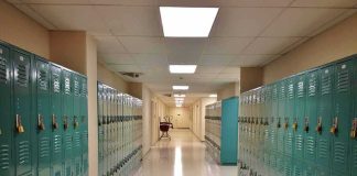 Hidden Camera Horror Inside Boys’ Locker Room School hallway with rows of teal lockers