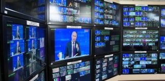 Fox Quip Turns Toxic — AOC Fires Back broadcast control room wall of monitors