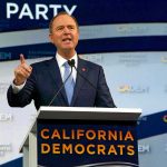 Stunning Voter Loss: 6.8 Million Disappear! Adam Schiff speaking at a podium during a conference
