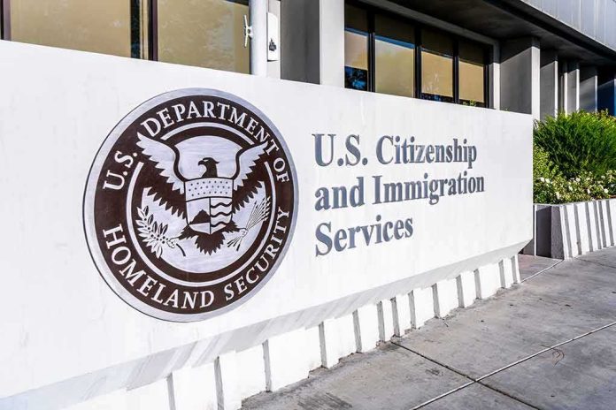 USCIS sign at a federal building entrance
