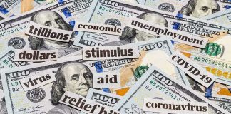2008’s Hard Stop – Then The Quiet Pivot Hundred-dollar bills with cutout words about stimulus and economy