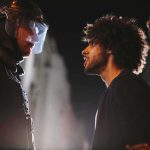 Officer Bitten, Kicked, Punched — And 5 Rioters Weren’t Even From NJ Protester faces police officer in riot gear at night