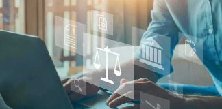 Person typing on laptop with legal icons overlay
