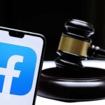 Shocking Ruling: App Can’t Enforce Gender Rules! Smartphone with Facebook app logo beside a judge’s gavel