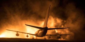 Airport Fuel Farm IGNITES – Riyadh Shaken Airplane on runway with large fire and smoke at night