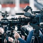 The Nashville Airport Could Soon Look Very Different Broadcast cameras on tripods at a press event