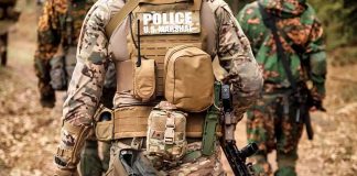 Deer DNA Leads Officers To A Disturbing Discovery Tactical officers in camouflage gear walking on a forest trail