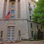 America’s Secret Terror Court Just Acted Stone government building with American flag at entrance