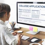 Florida’s New Admissions Rule Sparks Debate Student completing a college application on a desktop computer