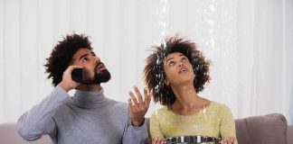 Fashion Moguls Dead – $100M Vanishes Couple on a couch reacting to water leaking from the ceiling