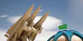 Game-Changer Spotted On Super Hornet missile launcher beside domed building with green flag