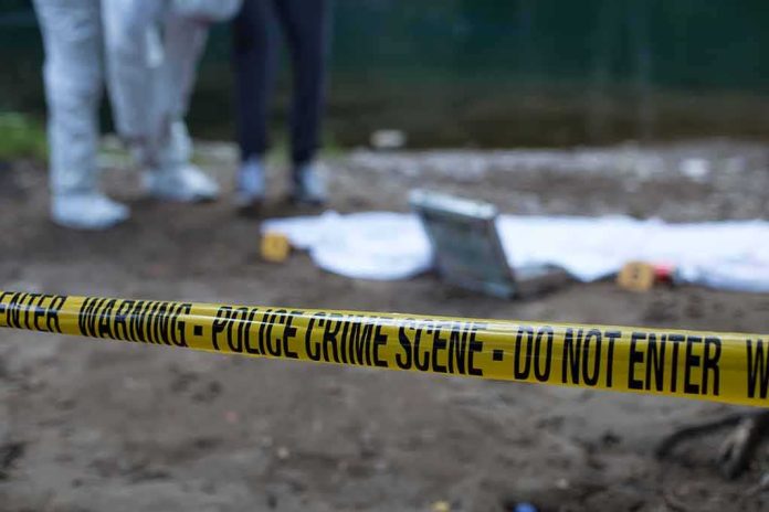 Police crime scene with yellow tape and forensic team