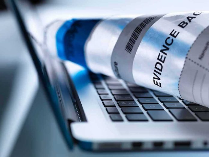 shutterstock_426298711 Evidence bag on a laptop keyboard