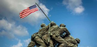 Sledgehammer Rampage Hits Sacred Memorial Marine Corps War Memorial with soldiers raising a U.S. flag