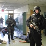 Witness Describes Shocking Scene Outside Bathroom Police officers responding to a school emergency with students on the floor