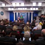 Threat Avalanche Hits Secret Service Press secretary at podium addressing reporters in briefing room